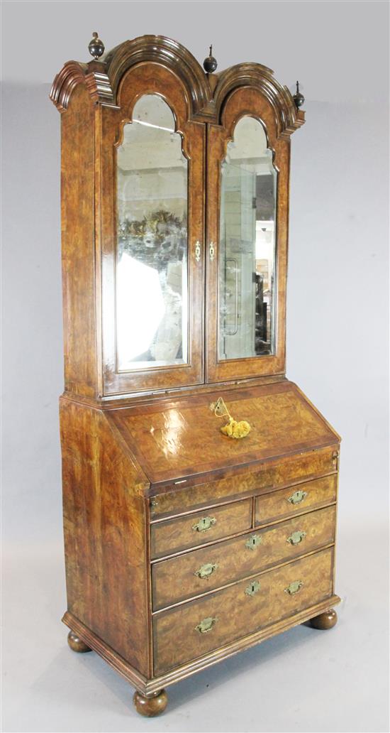 A George I and later walnut double dome bureau bookcase, W.3ft 3in. D.1ft 10in. H.7ft 4in.